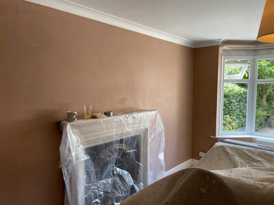 Smooth skim plastering on ceiling