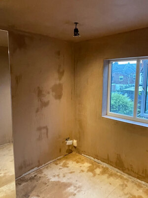 Smooth finish skim coat plastering