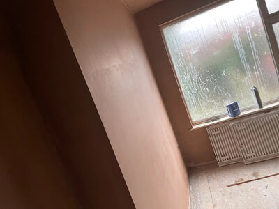 Plaster repairs on wall substrate