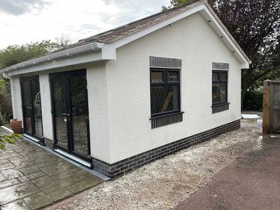 Monocouche through-colour rendering installation
